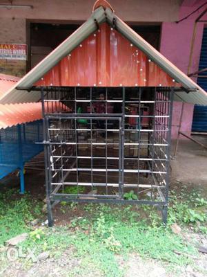Black And Brown Metal Dog Cage
