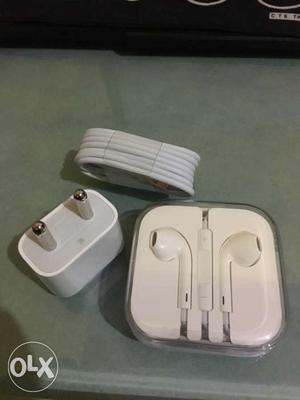 Original iPhone headphone and charger.. Brand
