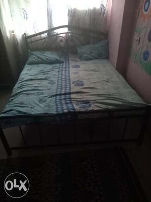 Queen size wrought iron bed (bed is in good