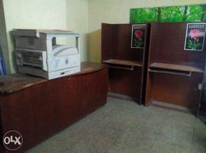 Wooden cabins & long size table with xerox