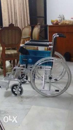 Gray And Green Wheelchair