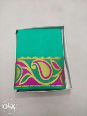 Green, Yellow, And Pink Floral Textile With Box