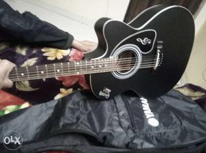 Only Four DyS OlD... black aquastic guitar brand