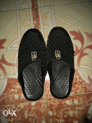Pair Of Black Slide-on Sandals