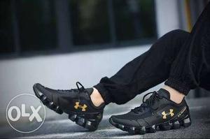 Pair Of Black Under Armour Shoes