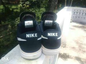 Pair Of Black-and-white Nike Sneaker