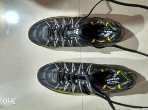 Pair Of Black-and-yellow Nivia Running Shoes (just used
