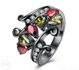 Silver-colored Ruby And Diamond Encrusted Ring