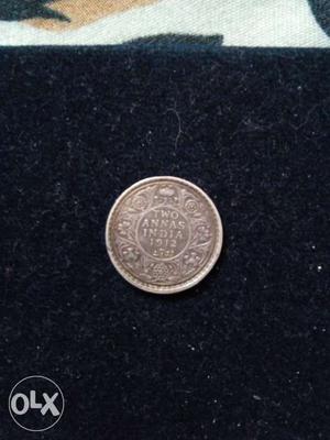 Silver old coin. Two annas.