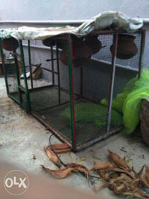 Red And Green Wooden Framed Green Screen Pet Cage