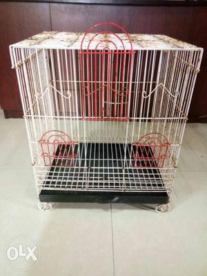Red And White Metal Birdcage