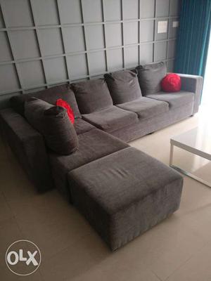 Almost New L shaped premium fabric grey sofa