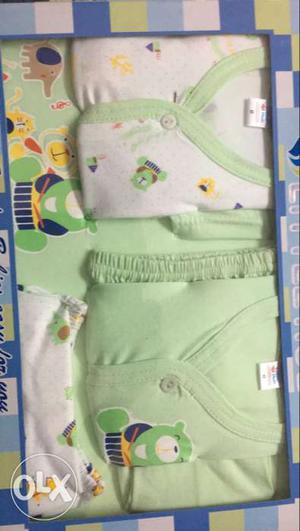 Baby's White And Green Onesie