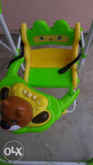 Baby's Yellow And Green Plastic Cradle'n Swing
