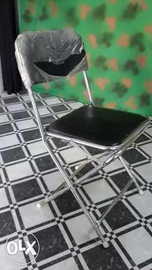 Black And Gray Folding Chair