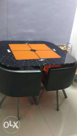 Black And Orange Wooden And Steel Dining Set