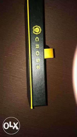 Black-and-yellow Corss Box
