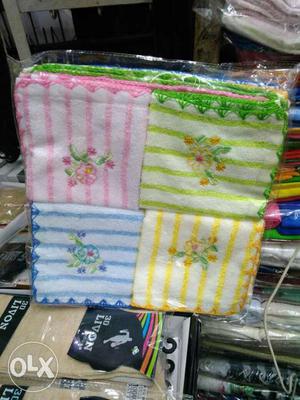 Blue, Yellow, Pink, And Green Floral Embroidered Textile