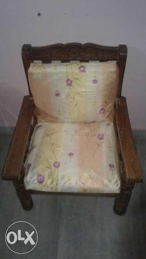 Brown Wooden Framed White And Green Floral Padded Armchair