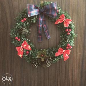 Christmas Wreath With Red Bow, Pine Cones And Mistletoe