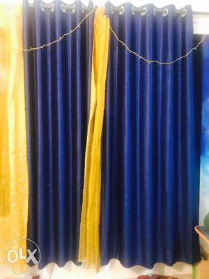 Door length navy blue curtains