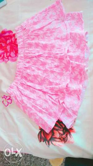 Mini skirt fr women...pink colour...thigh length...waist