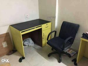 Office table and Rolling Arm Chair