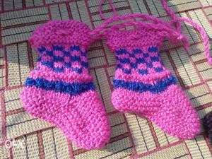 Pair Of Pink-and-blue Knitted Socks