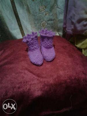 Pair Of Purple Knitted Boots