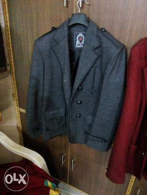 Party wear branded blazer for an eight to ten