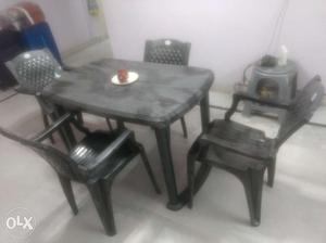 Plastic dining table (4 people) and 4 chairs