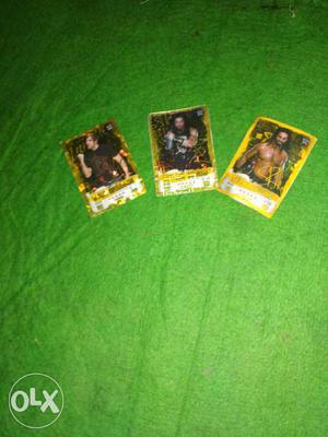 Three WWE Wrestler Collectible Trading Game Cards