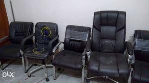 Two Black Leather Recliner Chairs