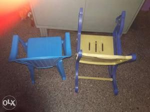 Two Blue And Beige Plastic Armchairs