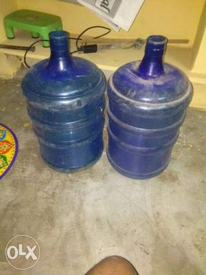 Two Blue Plastic Gallon Bottles