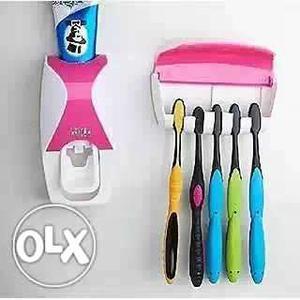 White And Pink Plastic Toothbrush Rack