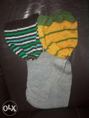 Yellow, Green, Black And White Knit Caps