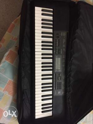 Black And White Electronic Keyboard with stand