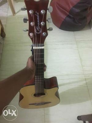 Brown Cutaway Acoustic Guitar