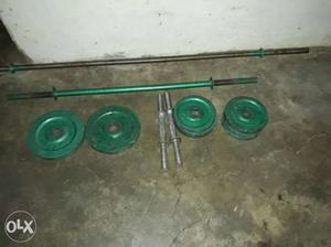 Green Barbell And Two Adjustable Dumbbells