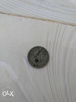 Old 25 pice coin 