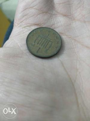 One penny.  Elizabeth coin