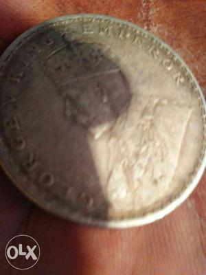 Round Silver-colored George Emperor Coin
