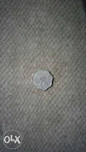 Silver-colored Scalloped Edge Coin