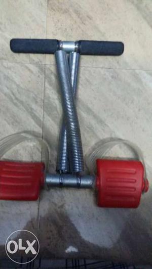 Grey And Red Exercise Tool