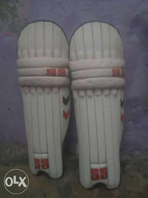 Pair Of White-and-red Knee Pads