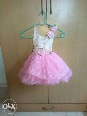 Party wear dress for 6-12 months girl child. Used