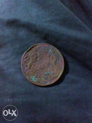 Round Copper Lion Embossed Coin