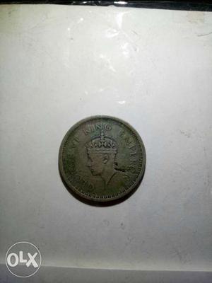 Round Copper-colored King Emperor Coin