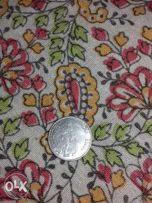 Round Silver-colored 1 Indian Coin